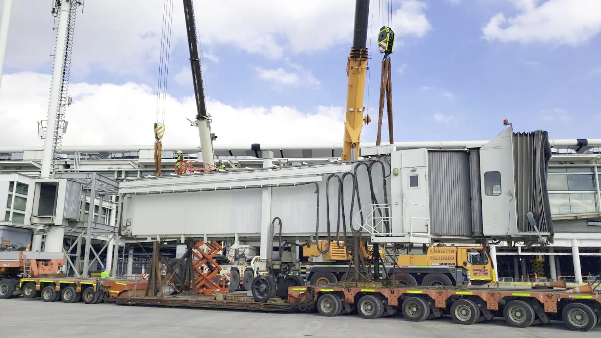 A complete boarding bridge on a special transport trailer, ready to be moved