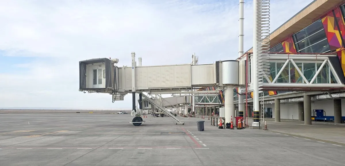 Boarding bridge attached to the terminal of an airport in Chile