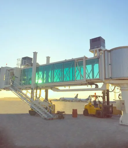 Boarding bridge attached to the terminal of an airport in Mexico