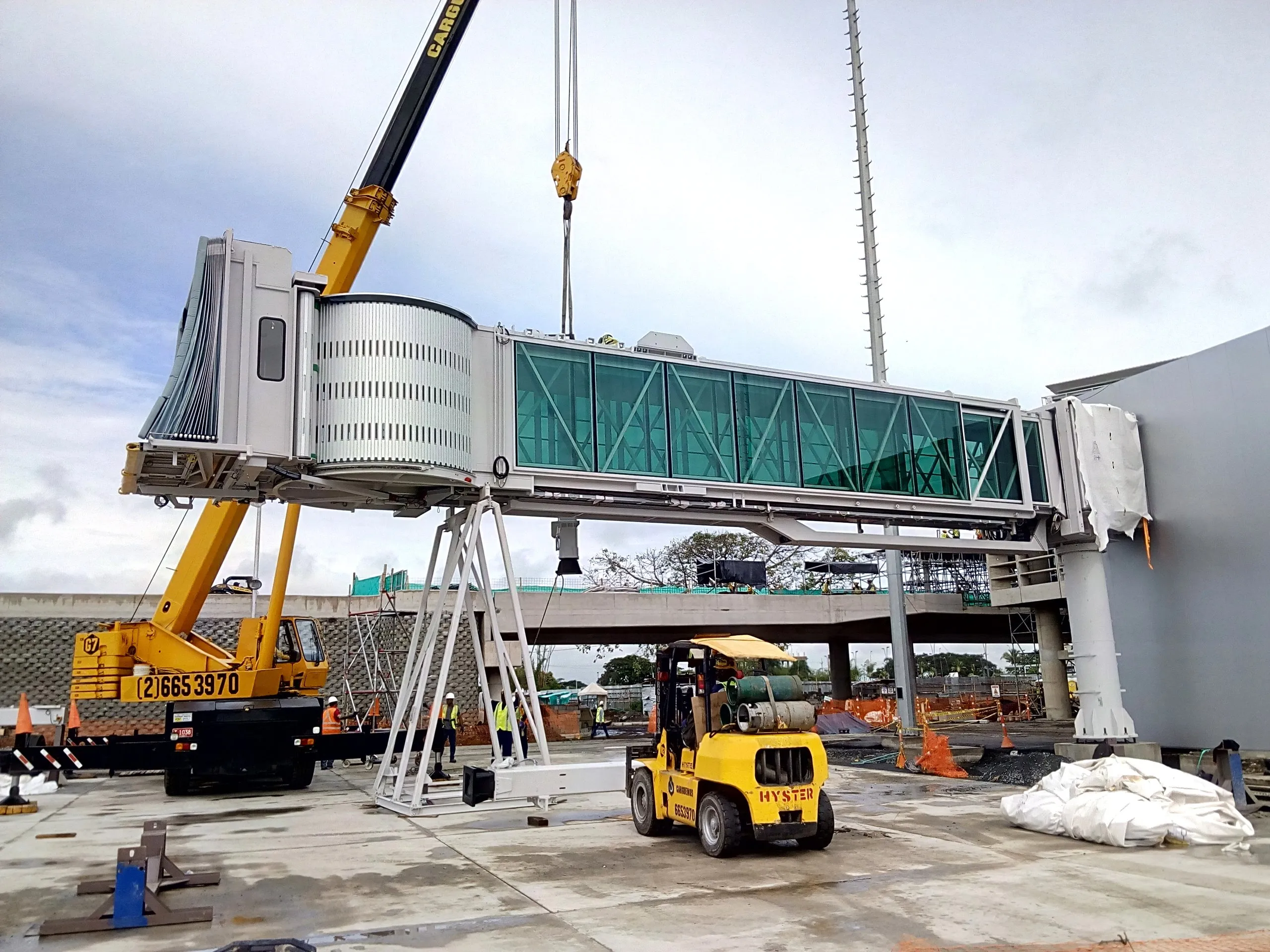 Installation of a new boarding bridge at an airport in Latin America